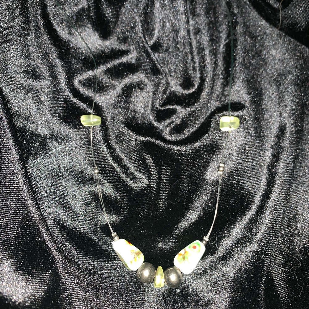 Asía motif necklace. Sold separately or as set.